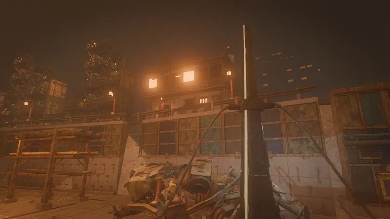 The harbour office lit up above a wall of salvage.